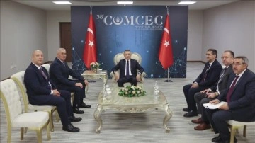 Cumhurbaşkanı Yardımcısı Oktay, KKTC Ekonomi ve Enerji Bakanı Olgun Amcaoğlu'nu onama etti