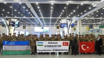 Hatay'da badiye hastanesi kuran Özbek ekibi ülkesinde törenle karşılandı